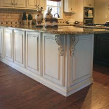 View this Mount Juliet customer’s kitchen cabinet transformation adding a warm modern Tuscan glaze look and switch plate artistry